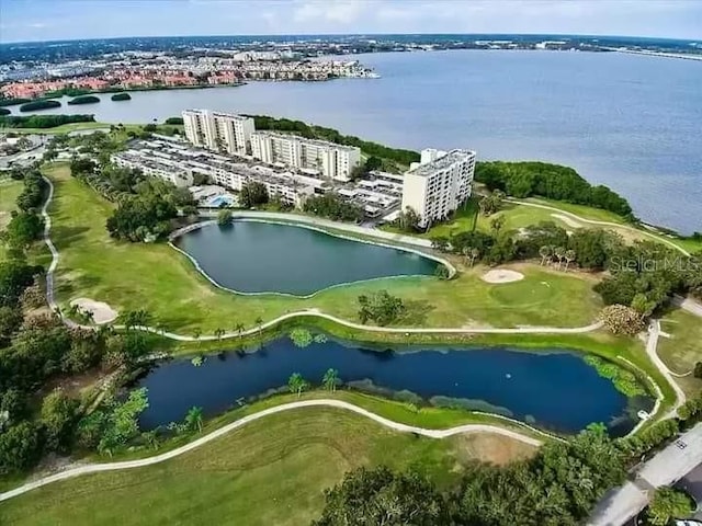 2615 Cove Cay Dr Unit 409, Clearwater, FL 33760 - drone / aerial view with a water view and golf course view