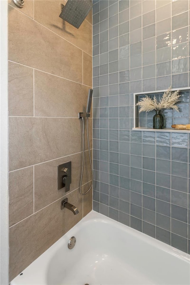 full bathroom with shower / washtub combination