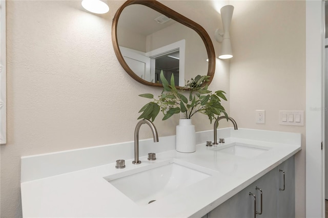 bathroom with double vanity