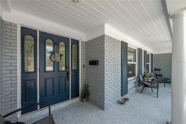 607 Carolyn Dr, Brandon, FL 33510 - entrance to property with a porch and brick siding