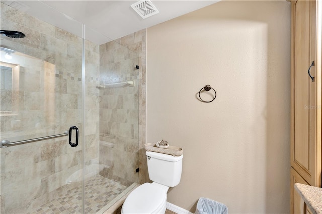 607 Carolyn Dr, Brandon, FL 33510 - bathroom with a stall shower, toilet, and visible vents