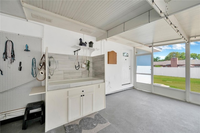 607 Carolyn Dr, Brandon, FL 33510 - misc room with visible vents and finished concrete floors