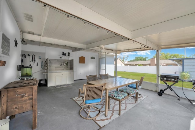 607 Carolyn Dr, Brandon, FL 33510 - view of patio / terrace with fence, outdoor dining space, and visible vents