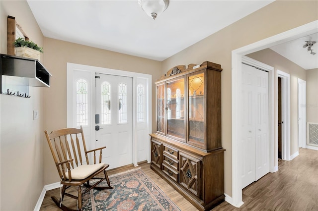 607 Carolyn Dr, Brandon, FL 33510 - entryway featuring visible vents, light wood finished floors, and baseboards