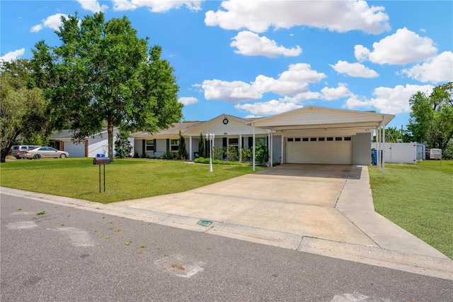 607 Carolyn Dr, Brandon, FL 33510 - ranch-style house with an attached garage, driveway, and a front yard