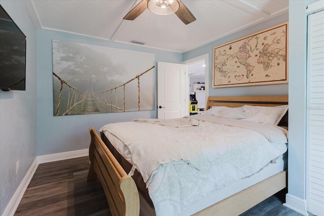 bedroom with visible vents, baseboards, ceiling fan, and wood finished floors