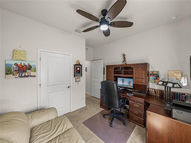 office space with ceiling fan, light carpet, and visible vents