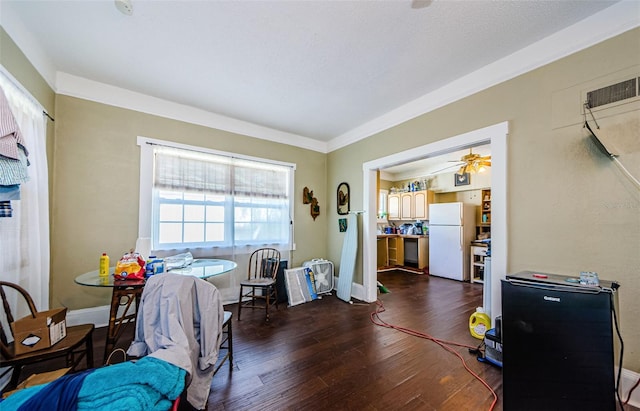 41 W Boyer St, Tarpon Springs, FL 34689 - dining area with dark wood-type flooring, a ceiling fan, and baseboards