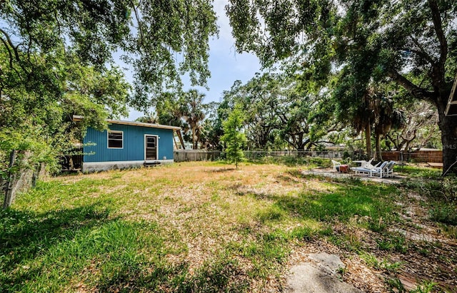 41 W Boyer St, Tarpon Springs, FL 34689 - view of yard featuring an outbuilding