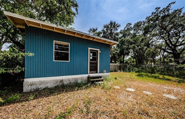 41 W Boyer St, Tarpon Springs, FL 34689 - view of outbuilding with fence and entry steps