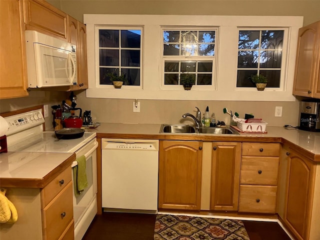 41 W Boyer St, Tarpon Springs, FL 34689 - kitchen featuring white appliances, a sink, and light countertops