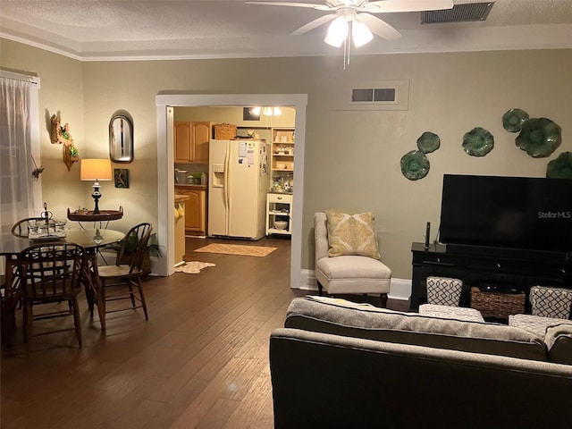 41 W Boyer St, Tarpon Springs, FL 34689 - living room with a ceiling fan, dark wood-style floors, and crown molding