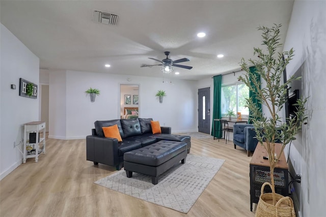 506 Summerwood Ct, Tarpon Springs, FL 34689 - living room with light wood finished floors, recessed lighting, a ceiling fan, and baseboards