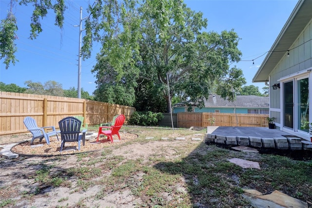 506 Summerwood Ct, Tarpon Springs, FL 34689 - fenced backyard with a wooden deck