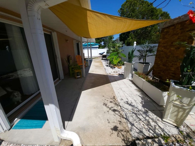 view of patio featuring a fenced backyard