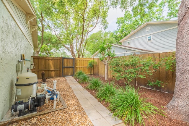 3714 Village Estates Pl, Tampa, FL 33618 - view of yard featuring a fenced backyard and a gate