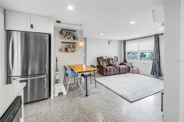 living room featuring light speckled floor and recessed lighting
