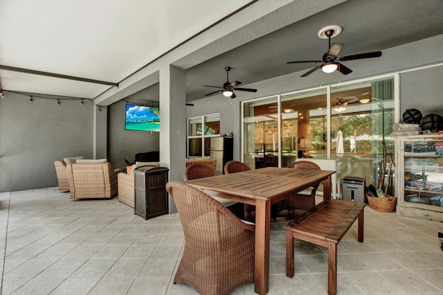 view of patio featuring a ceiling fan