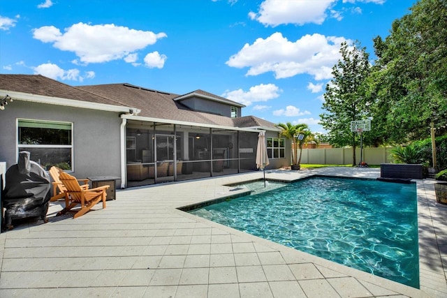 view of pool featuring a fenced in pool, fence, and a sunroom