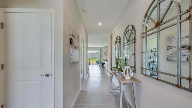 7763 Wheat Stone Dr, Zephyrhills, FL 33540 - hallway featuring baseboards, recessed lighting, and light tile patterned flooring