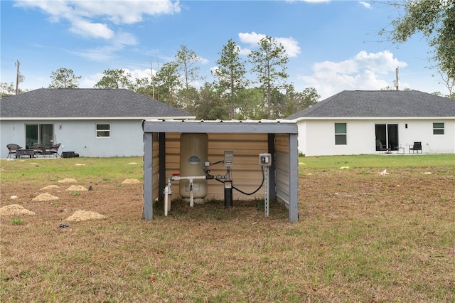 14404 SW 19th Pl, Ocala, FL 34481 - exterior space with a patio, stucco siding, and a yard
