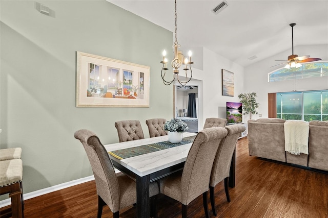 dining area with visible vents, baseboards, dark wood-style floors, high vaulted ceiling, and ceiling fan with notable chandelier
