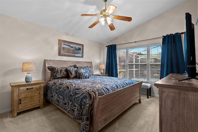 bedroom with baseboards, a ceiling fan, lofted ceiling, and light colored carpet