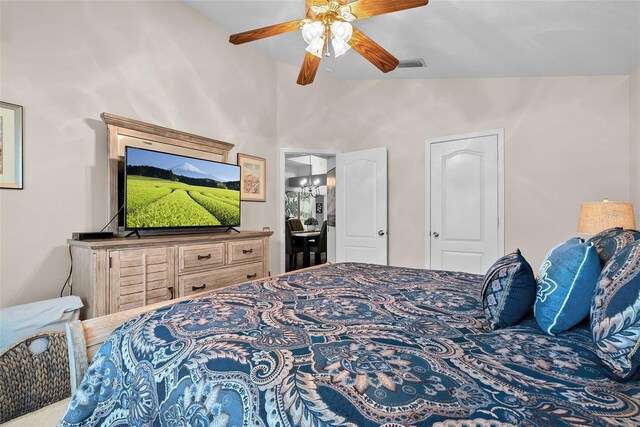 bedroom featuring ceiling fan and visible vents