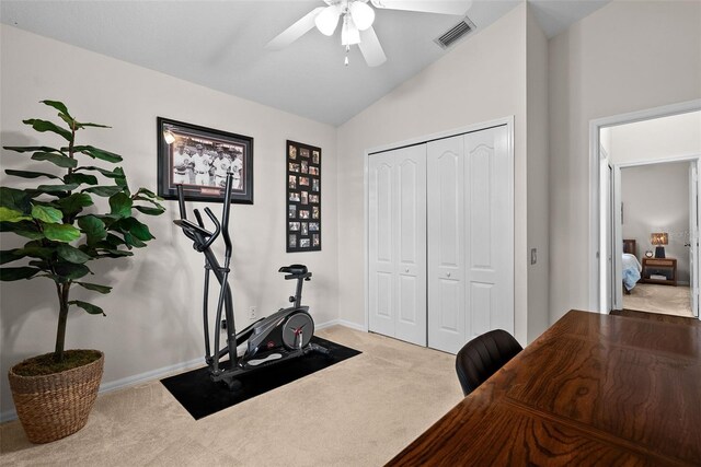 workout room featuring visible vents, baseboards, a ceiling fan, carpet, and vaulted ceiling