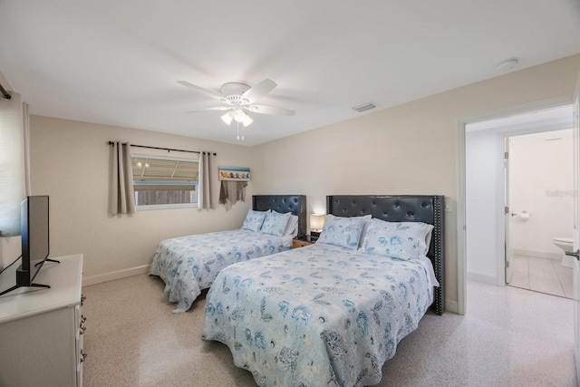 bedroom with visible vents, baseboards, and ceiling fan