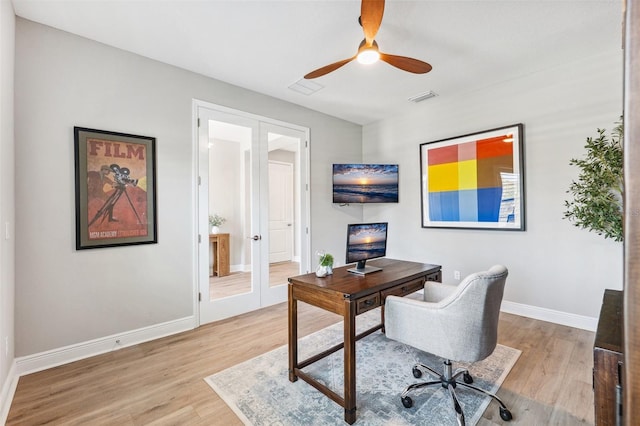 office area featuring french doors, a ceiling fan, baseboards, and wood finished floors