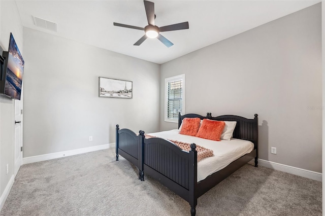 bedroom featuring carpet floors, baseboards, and visible vents