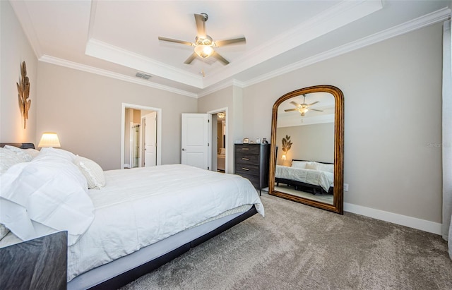 2653 Longleaf Pine Pt, New Port Richey, FL 34655 - carpeted bedroom featuring a tray ceiling, ornamental molding, and a ceiling fan