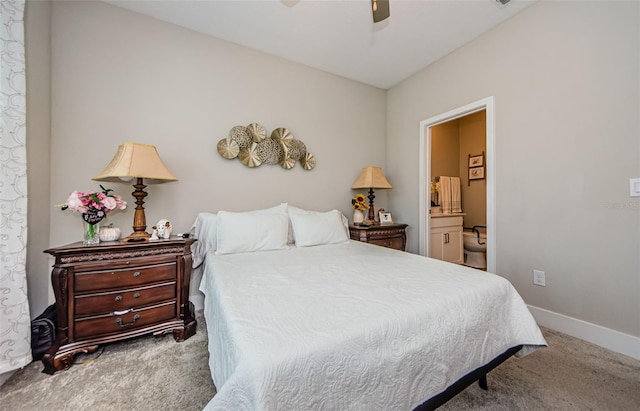 2653 Longleaf Pine Pt, New Port Richey, FL 34655 - bedroom with carpet flooring, ceiling fan, and ensuite bath