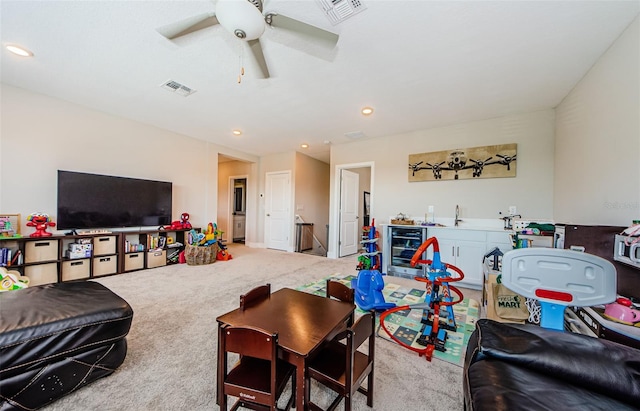 2653 Longleaf Pine Pt, New Port Richey, FL 34655 - living area featuring wine cooler, carpet, ceiling fan, and recessed lighting