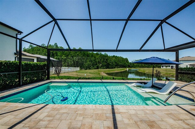2653 Longleaf Pine Pt, New Port Richey, FL 34655 - swimming pool with a water view, a patio area, and a lanai