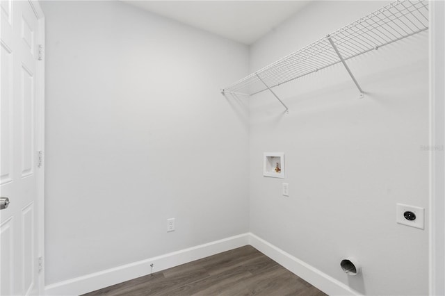 clothes washing area with laundry area, hookup for a washing machine, baseboards, hookup for an electric dryer, and dark wood-style floors