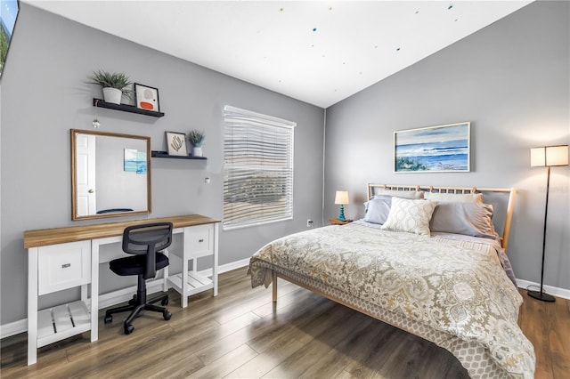 12323 Country White Cir, Tampa, FL 33635 - bedroom with baseboards, lofted ceiling, and wood finished floors