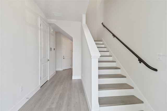 4717 W Mccoy St Unit 2, Tampa, FL 33616 - stairway with wood finished floors and baseboards