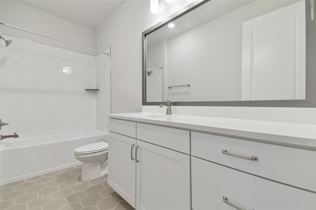 4717 W Mccoy St Unit 2, Tampa, FL 33616 - bathroom featuring toilet, vanity, shower / bathtub combination, and tile patterned floors