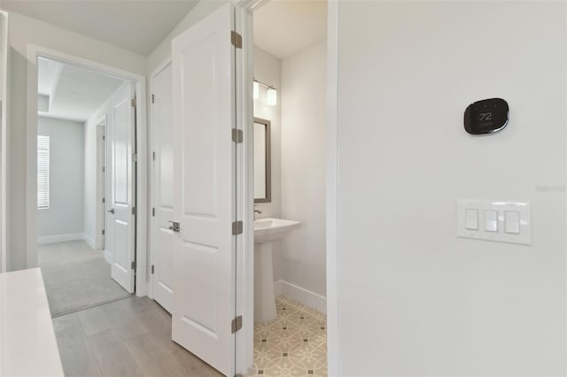 4717 W Mccoy St Unit 2, Tampa, FL 33616 - bathroom with baseboards
