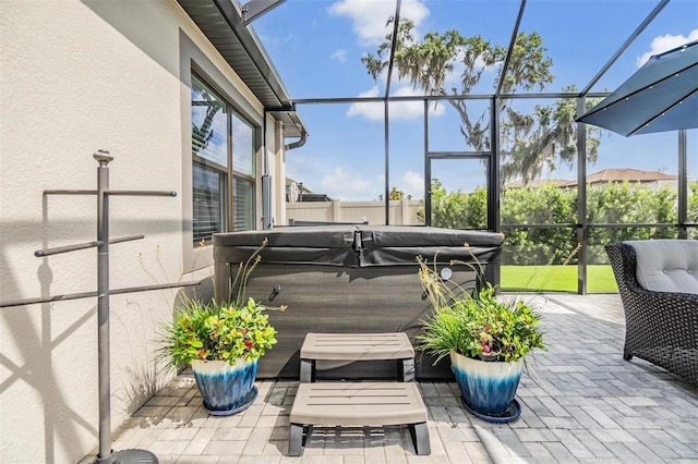 exterior space with a hot tub