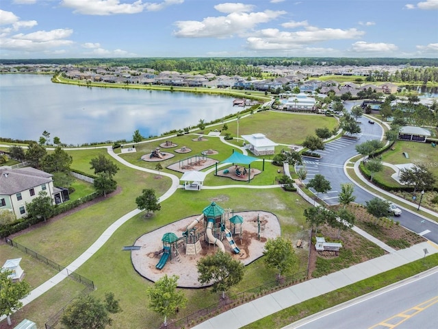 bird's eye view featuring a water view and a residential view
