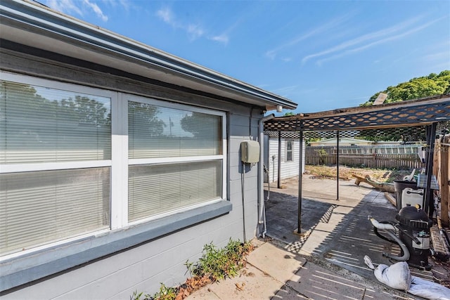 view of patio with fence