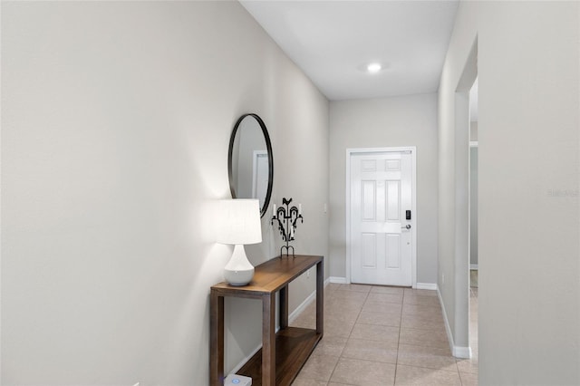 5208 Dandelion St, Apollo Beach, FL 33572 - entryway featuring baseboards and light tile patterned floors