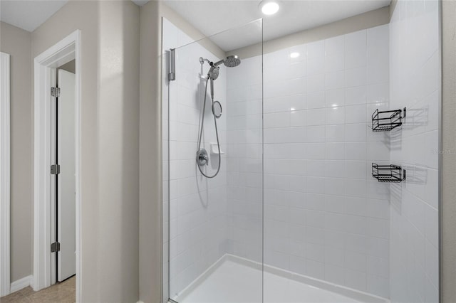 5208 Dandelion St, Apollo Beach, FL 33572 - bathroom featuring a tile shower