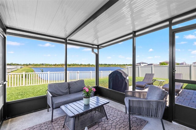 5208 Dandelion St, Apollo Beach, FL 33572 - sunroom with a water view and outdoor lounge area