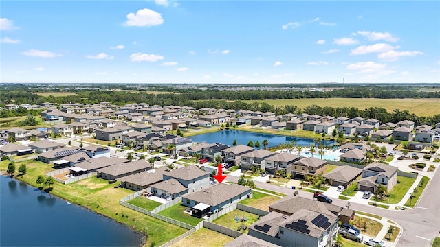 5208 Dandelion St, Apollo Beach, FL 33572 - bird's eye view featuring a water view and a residential view