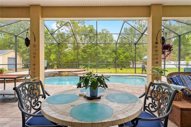 swimming pool featuring a patio, a lanai, an outdoor structure, and a shed