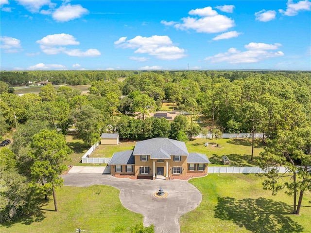 view from above of property featuring a forest
